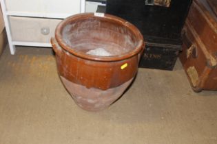 A half glazed stoneware planter