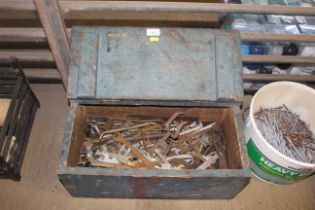 A blue painted wooden tool box with hinged lid and