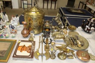 A quantity of various brass and silver plated ware