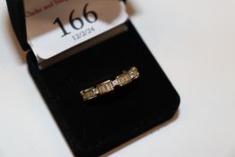A 925 silver gilt eternity ring, set with baguette