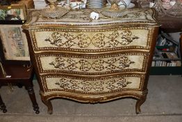 A cream and gilt decorated French style serpentine