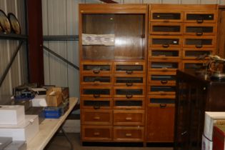 A vintage golden oak haberdashery cabinet by Liddl