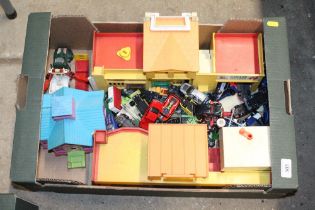 A box containing various toys to include Fisher Pr