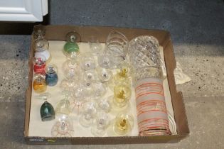 A box of various table glassware