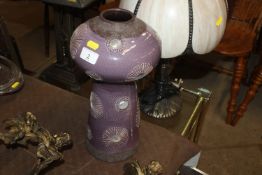 A large purple Studio pottery vase, indistinctly s