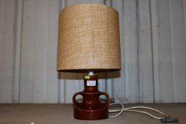 A Kabaka ware brown glazed pottery table lamp with