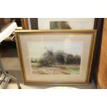 An oak framed print "September Eve"; a gilt framed