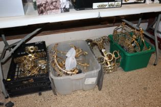 Various brass ceiling light fittings, hung with gl