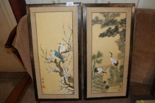 A pair of Oriental studies depicting birds on a bl