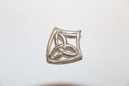 An SG solid sterling silver shield brooch