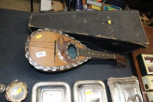 A cased Neapolitan mandolin by Fratelli Frati in f