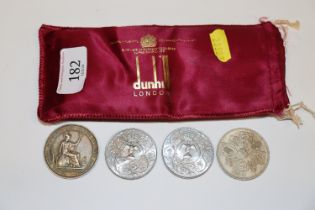 A Dunhill bag containing 1953 five Shilling; two C