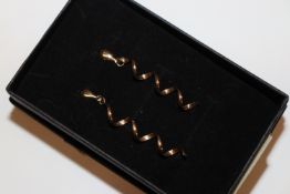A pair of 9ct gold drop ear-rings, approx. 1gms