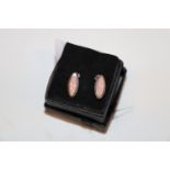 A pair of sterling silver and pink opal ear-rings