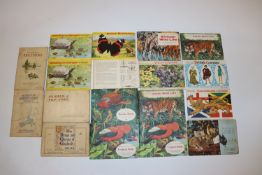 A box containing albums;  tea cards