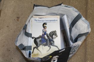 A bag of The Foreign Correspondent magazine