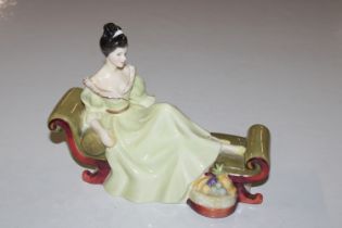 A Royal Doulton figurine "At Ease" HN2473