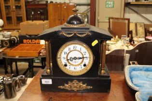 A mantel clock converted to battery movement