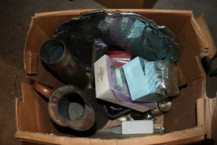 A box containing shell casings, copper jug, silver