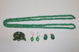 A Pecking glass style beaded necklace; brooch and