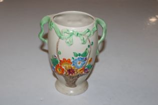 A Bouquet floral decorated twin handled vase and a