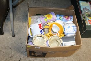 A box of various mugs; a Disney storage jar and co