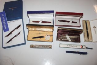 A box of fountain pens and other pens including Sh