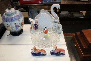 A glass cake stand; a Devon swan; a pair of Staffordshire greyhound quill holders etc.