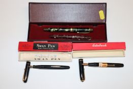 A Delarue fountain pen; a Burnham fountain pen wit