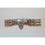 A hallmarked sterling silver five bar gate link bracelet with padlock clasp, approx. 16.5gms