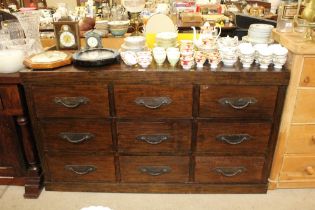 A hardwood chest fitted nine drawers