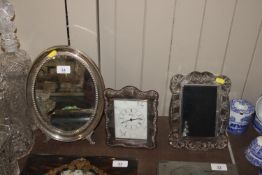 A white metal mounted easel framed mirror; a