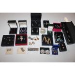A box containing a large quantity of ear-rings and