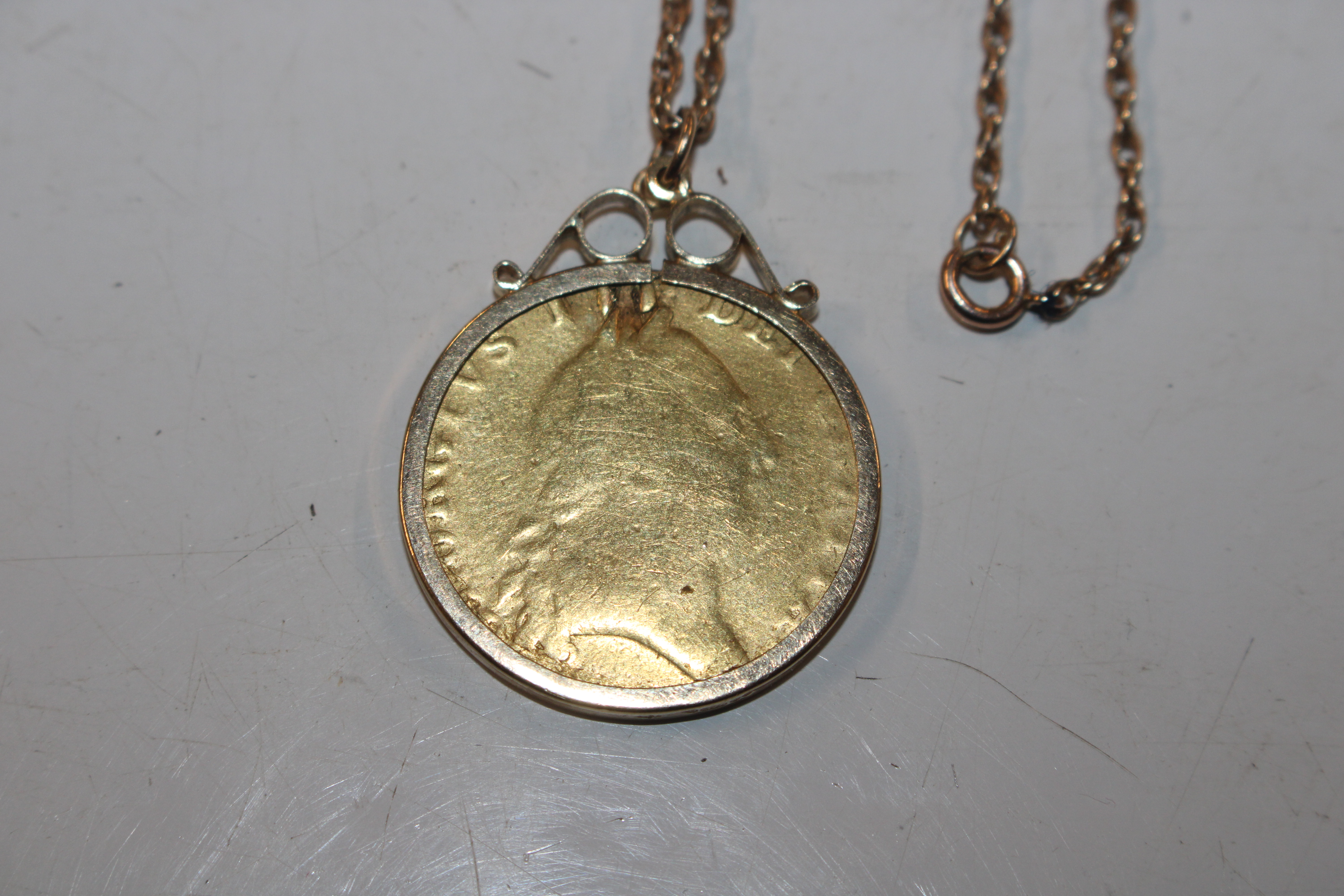 A Guinea contained in 9ct gold mount and hung to y - Image 2 of 5