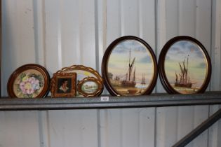 A pair of paintings depicting sailing barges at lo