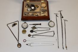 A silver cased pocket watch; another pocket watch;
