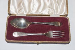A cased silver fork and spoon, approx. total weigh