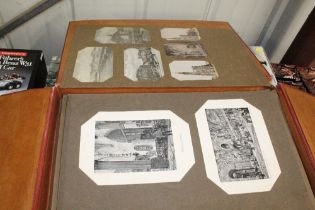 A large folio album containing photographs of Rome and Venice