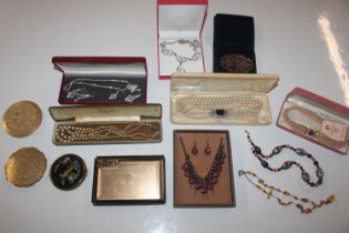 A box of various costume jewellery to include simu