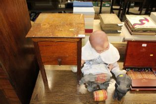 An oak sewing box; a large doll; and a vintage ele