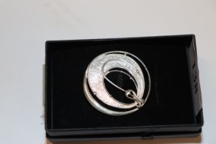 An Ola GoriE Edinburgh hallmark sterling silver mackintosh style brooch, approx. 8gms