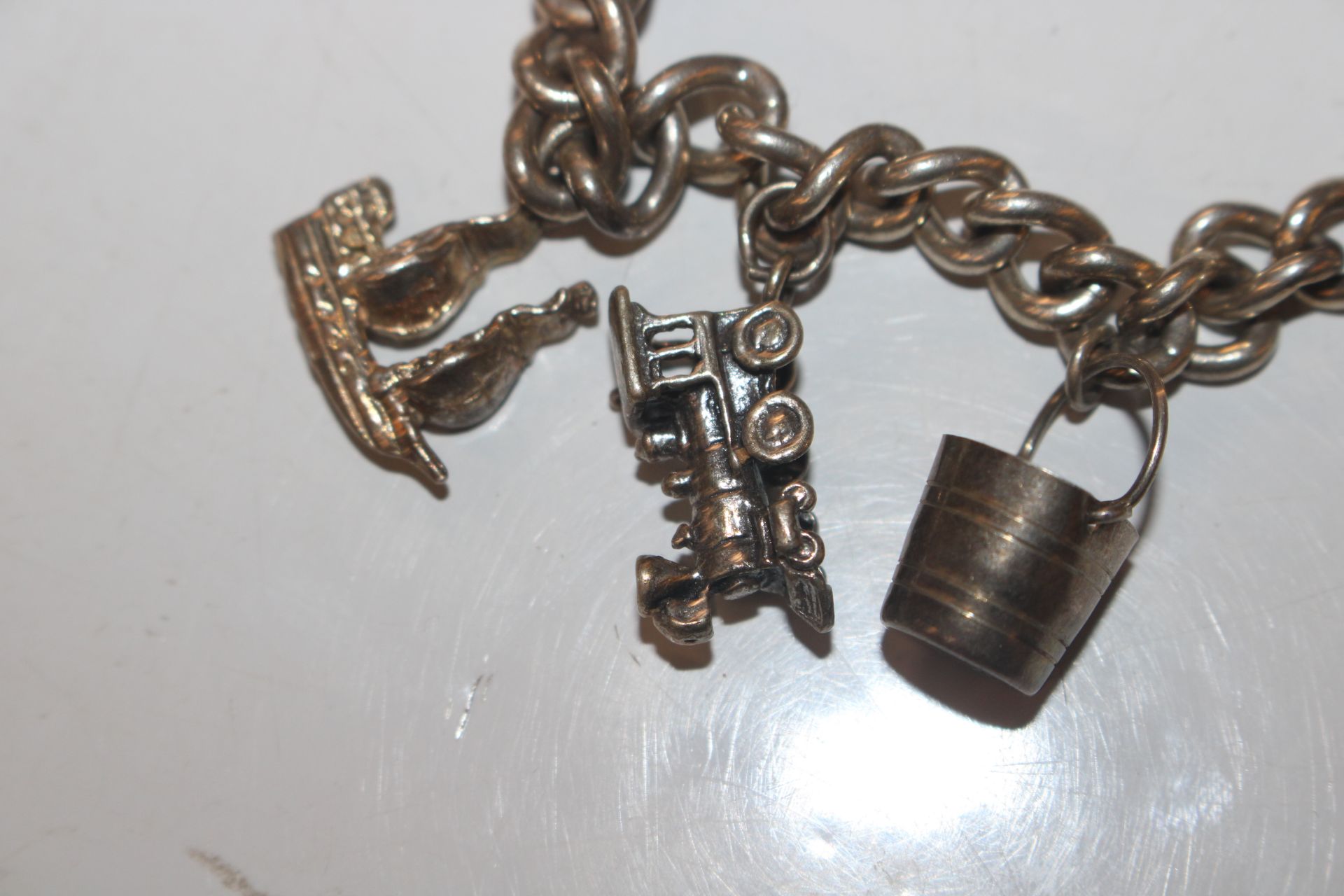 A silver charm bracelet; another charm bracelet an - Image 19 of 20