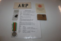 ARP WWII defence medal in box with armband and sil