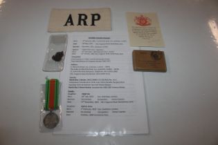 ARP WWII defence medal in box with armband and sil