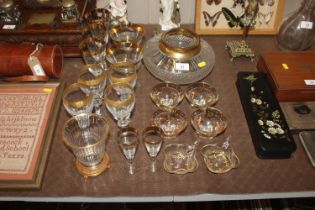 A collection of Moser style gilt rimmed glassware etc.