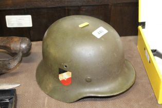 A German WWII type Double Decal helmet