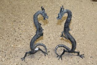 A pair of bronzed dragons