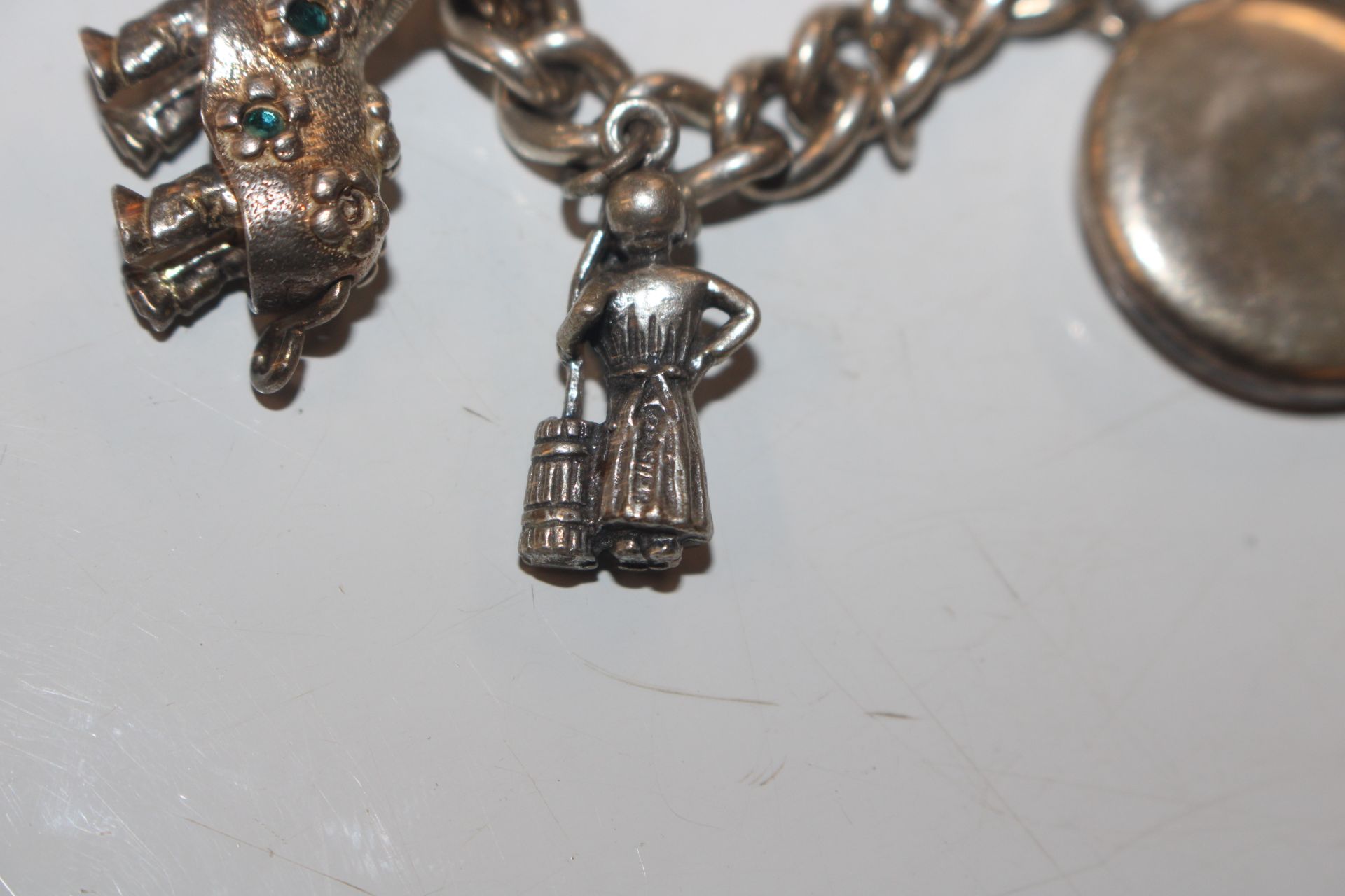 A silver charm bracelet; another charm bracelet an - Image 18 of 20