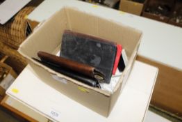 A box containing purses; wallets; gramophone needl
