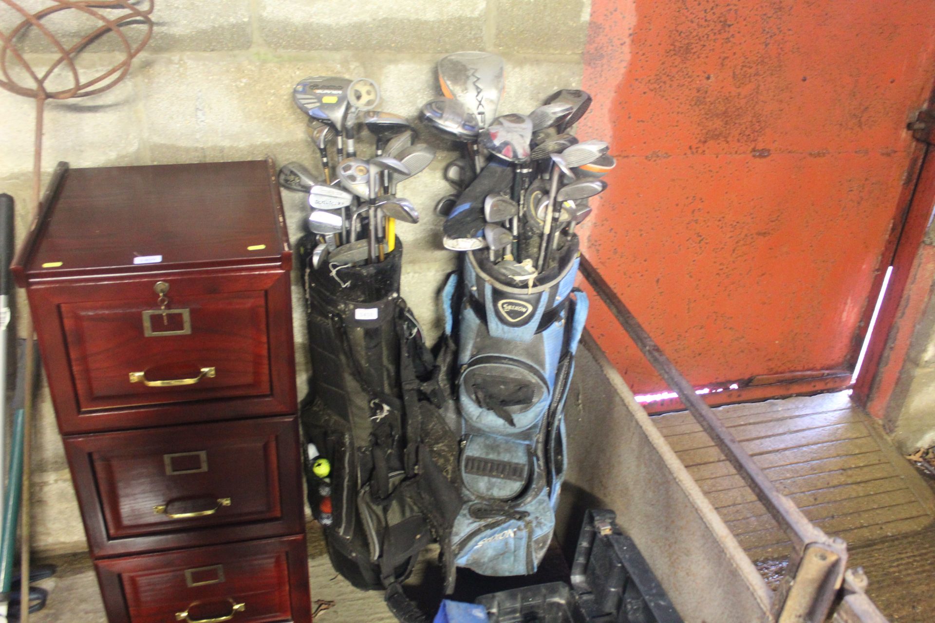 Two golf bags and a quantity of various clubs to i